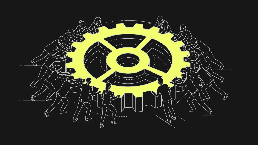 Team pushing a large gear, top HR automation trends in 2026